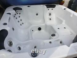 HOT TUB Torina used 5 seater spa. Sterling silver acrylic and grey skirting/side