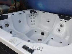 HOT TUB Torina used 5 seater spa. Sterling silver acrylic and grey skirting/side