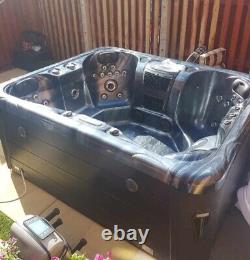 Hot tub used, black outside blue inside, excellent condition, well looked after