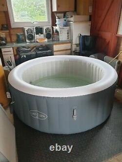 Lay z spa bali led light 4 person hot tub with starter kit and mats