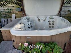 Six Seater solid hot tub with cover and furniture